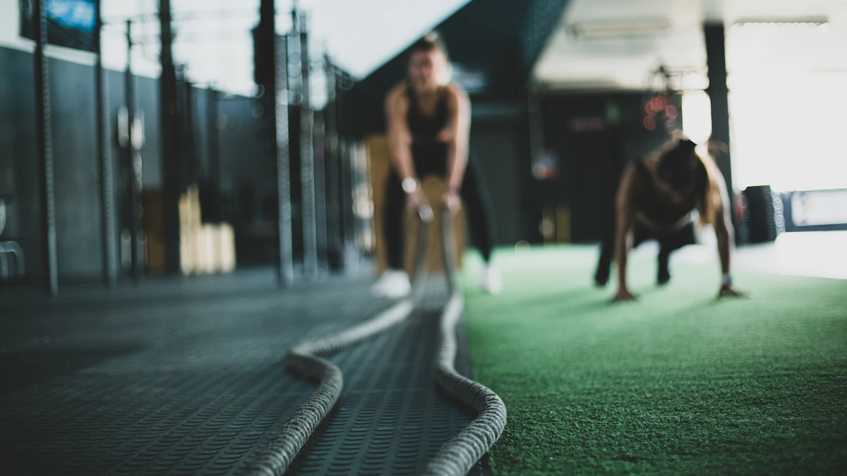 Coach demonstrating a balance exercise inside the studio